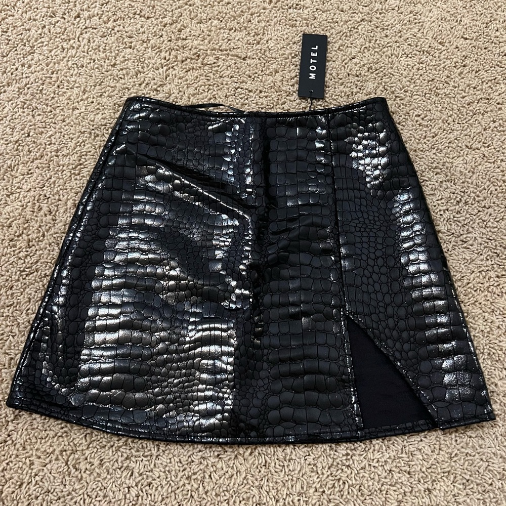 Women’s black mini skirt.